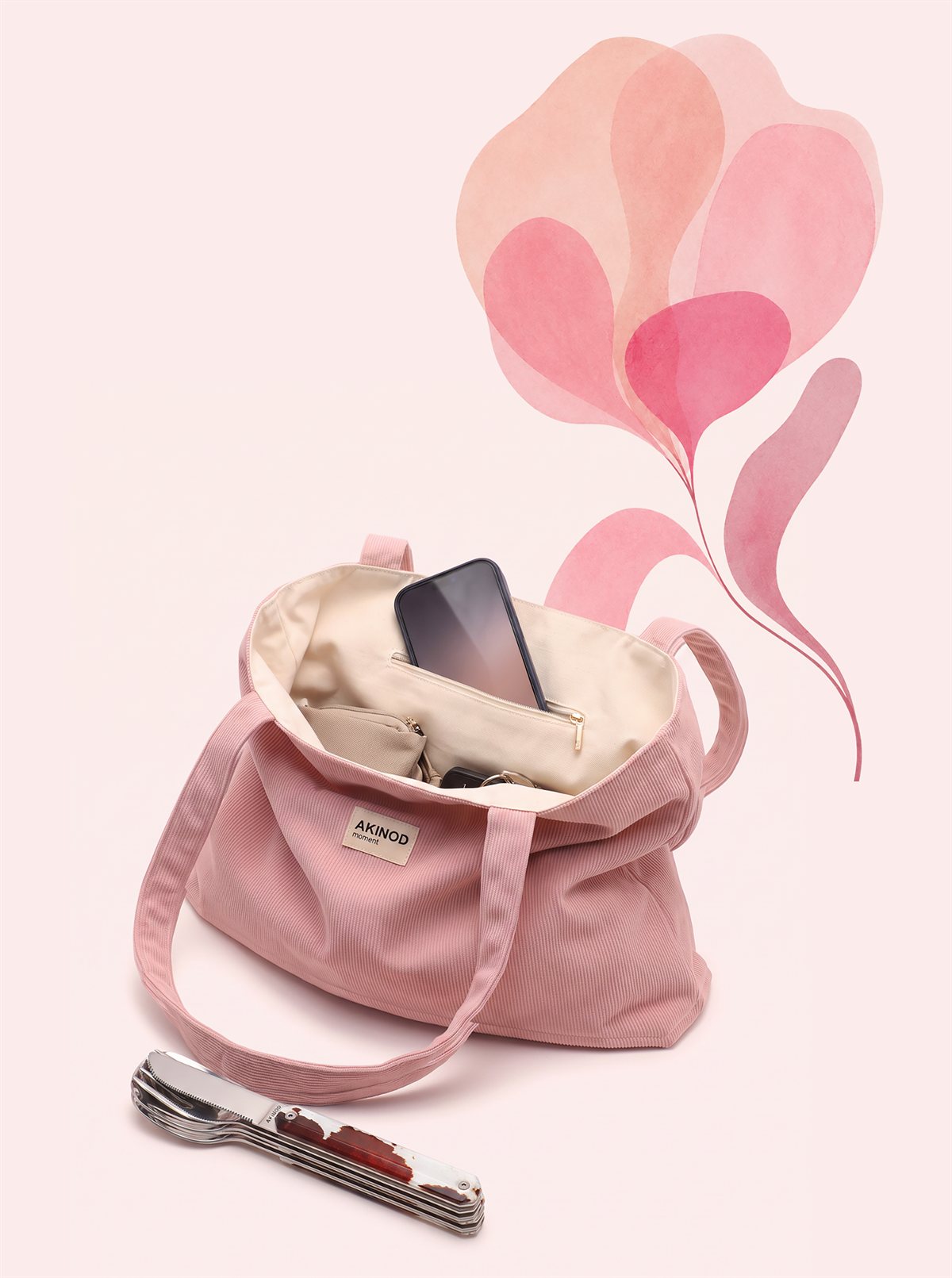 Détail du velours côtelé et de l'étiquette AKINOD moment sur le tote bag rose